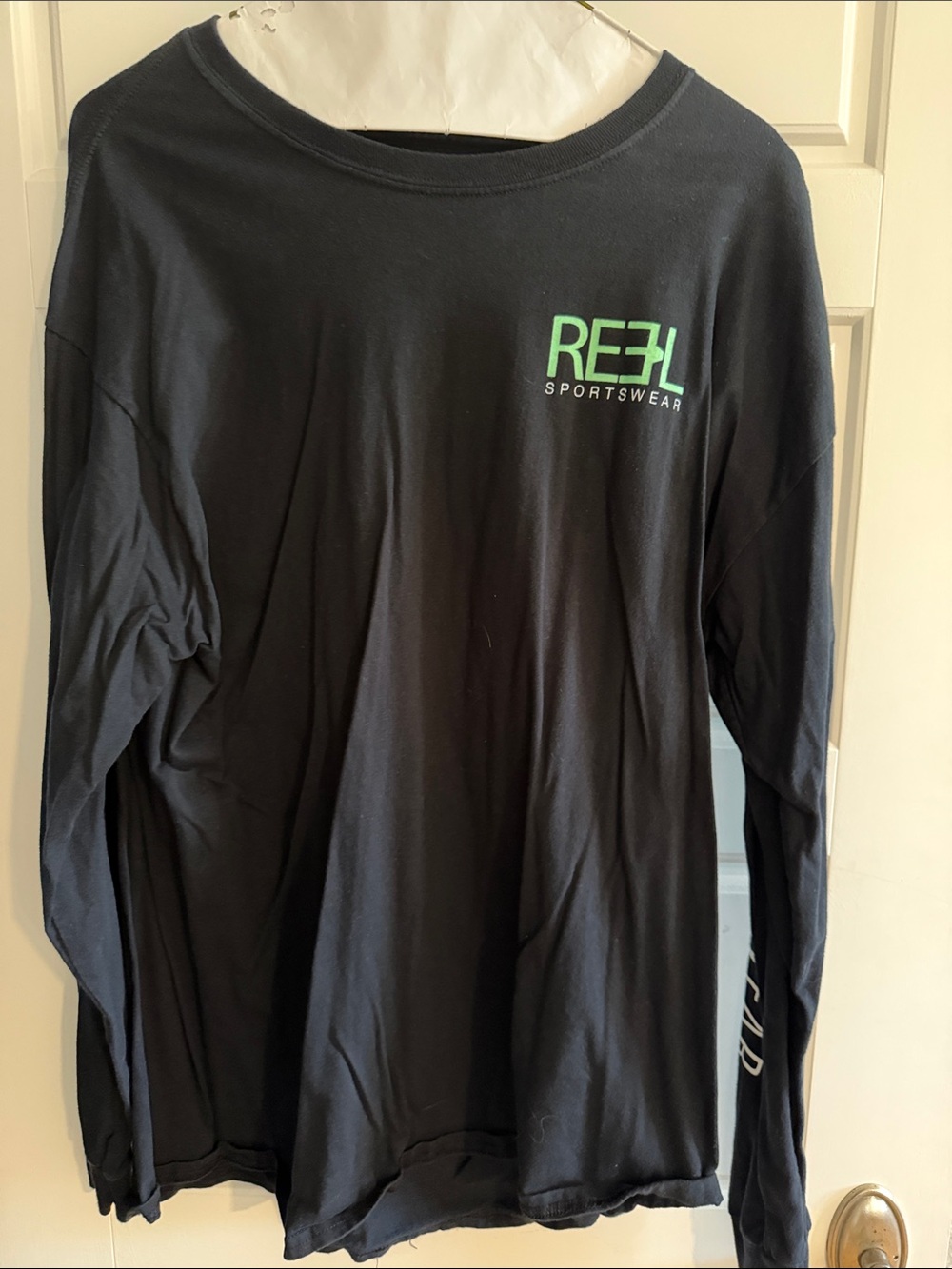 REEL Sportswear Men’s Black Long-Sleeve Tee with Green Logo